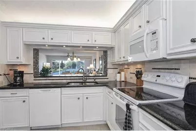 1250 Yesica Ann Cir #E102, Naples, FL 34110 - Photo 7