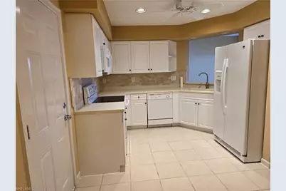 25069 Peacock Ln #101, Naples, FL 34114 - Photo 17