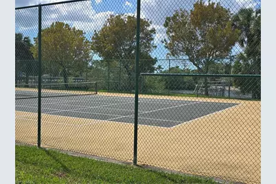 25069 Peacock Ln #101, Naples, FL 34114 - Photo 9