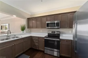 7687 Pebble Creek Cir, Naples, FL 34108 - Photo 11