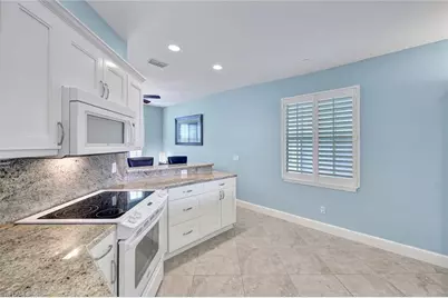 5945 Sand Wedge Ln #1003, Naples, FL 34110 - Photo 9