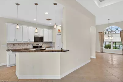 25080 Divot Dr, Bonita Springs, FL 34135 - Photo 5