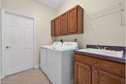 25080 Divot Dr, Bonita Springs, FL 34135 - Photo 23