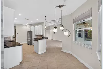 25080 Divot Dr, Bonita Springs, FL 34135 - Photo 9