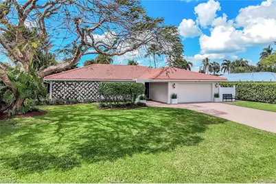 87 Burning Tree Dr, Naples, FL 34105 - Photo 1