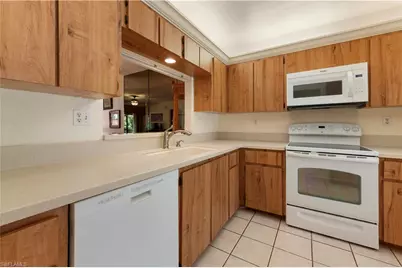 1822 Kings Lake Blvd #102, Naples, FL 34112 - Photo 3