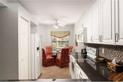 2585 Old Groves Rd #L102, Naples, FL 34109 - Photo 5