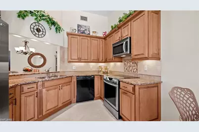 577 Beachwalk Cir #R202, Naples, FL 34108 - Photo 9