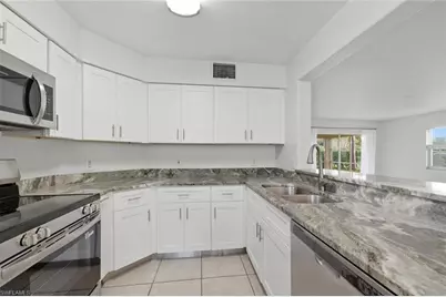 9570 Crescent Garden Dr #A102, Naples, FL 34109 - Photo 3