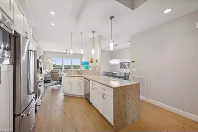 7687 Pebble Creek Cir #403, Naples, FL 34108 - Photo 9