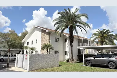 59 Camelot Gardens Blvd #110, Lehigh Acres, FL 33936 - Photo 1