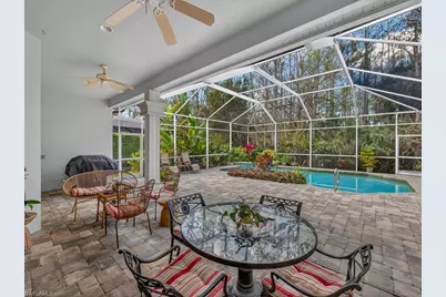 5875 Whisperwood Ct, Naples, FL 34110 - Photo 17