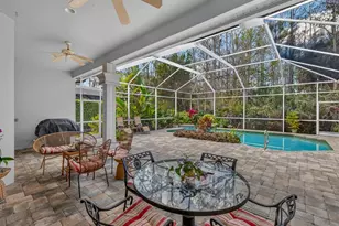 5875 Whisperwood Ct, Naples, FL 34110 - Photo 17