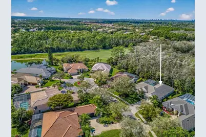 5875 Whisperwood Ct, Naples, FL 34110 - Photo 21