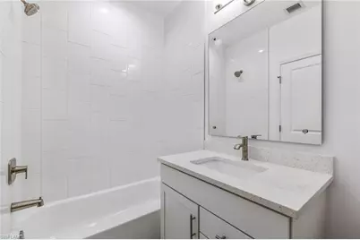 7574 Rockefeller Dr, Naples, FL 34119 - Photo 23