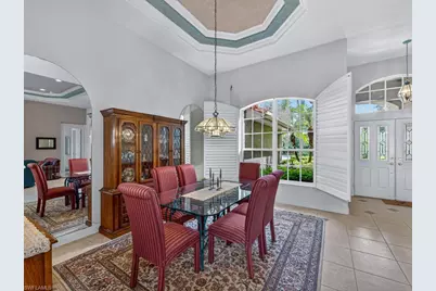 5839 Whisperwood Ct, Naples, FL 34110 - Photo 9