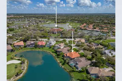 5839 Whisperwood Ct, Naples, FL 34110 - Photo 25