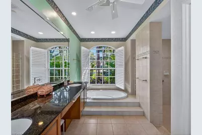 5839 Whisperwood Ct, Naples, FL 34110 - Photo 11