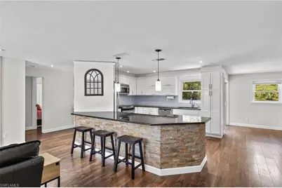 210 29th St SW, Naples, FL 34117 - Photo 1