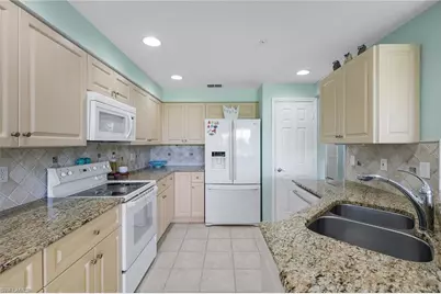 25276 Pelican Creek Cir #102, Bonita Springs, FL 34134 - Photo 9