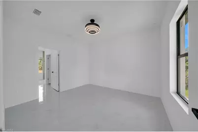 704 Holmes Ave, Lehigh Acres, FL 33974 - Photo 11