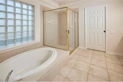 9301 Troon Lakes Dr, Naples, FL 34109 - Photo 13