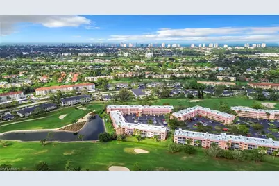 180 Turtle Lake Ct #103, Naples, FL 34105 - Photo 1