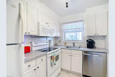 180 Turtle Lake Ct #103, Naples, FL 34105 - Photo 9