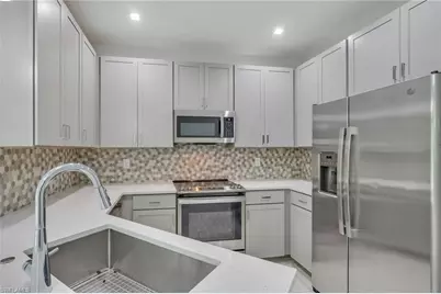 7501 Carnegie Way, Naples, FL 34119 - Photo 5