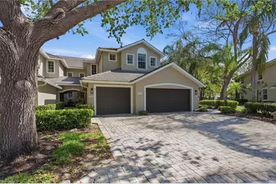 7134 Blue Juniper Ct #202, Naples, FL 34109 - Photo 1