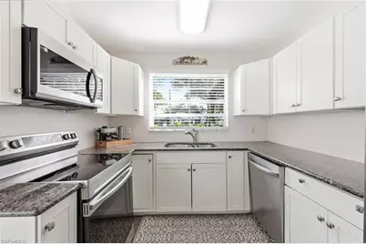 10548 Quincy Ct, Lehigh Acres, FL 33936 - Photo 15