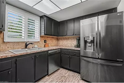 215 Cypress Way E #E2, Naples, FL 34110 - Photo 7