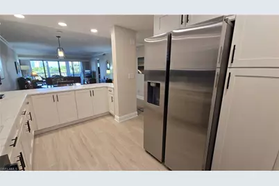 12945 Vanderbilt Dr #402, Naples, FL 34110 - Photo 15