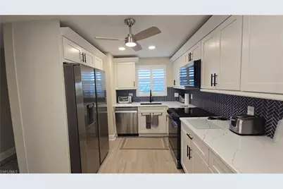 12945 Vanderbilt Dr #402, Naples, FL 34110 - Photo 17