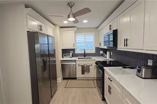 12945 Vanderbilt Dr, Naples, FL 34110 - Photo 17