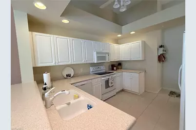 3555 Laurel Greens Ln N #202, Naples, FL 34119 - Photo 7