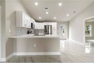 1076 Gunby Ave S, Lehigh Acres, FL 33974 - Photo 19