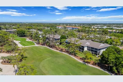 770 Eagle Creek Dr #102, Naples, FL 34113 - Photo 1