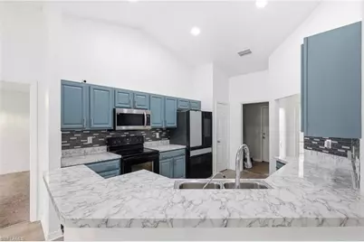 2009 NE 13th Pl, Cape Coral, FL 33909 - Photo 7