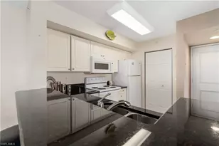 1265 Wildwood Lakes Blvd, Naples, FL 34104 - Photo 9