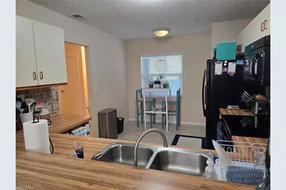 5741 Whitaker Rd #D-203, Naples, FL 34112 - Photo 5