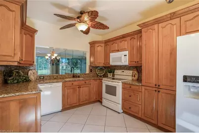 725 Saratoga Cir #A103, Naples, FL 34104 - Photo 9