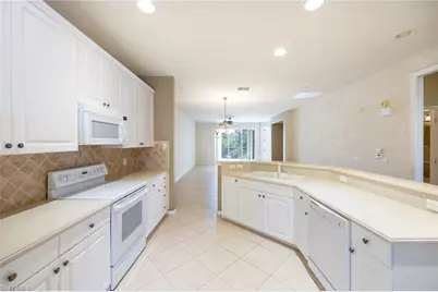 4884 Hampshire Ct #203, Naples, FL 34112 - Photo 13