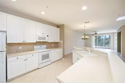 4884 Hampshire Ct #203, Naples, FL 34112 - Photo 11