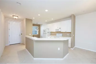 4884 Hampshire Ct #203, Naples, FL 34112 - Photo 3