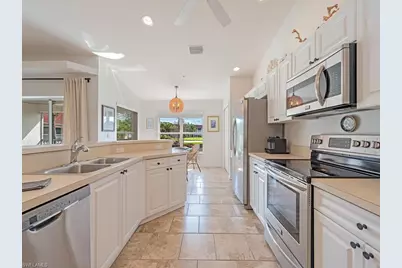 2880 Cypress Trace Cir #202, Naples, FL 34119 - Photo 3