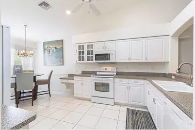 8535 Ibis Cove Cir #M661, Naples, FL 34119 - Photo 13
