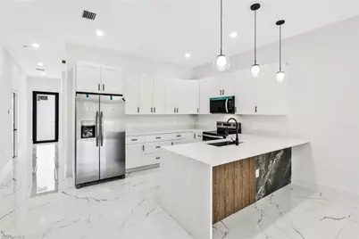 521 Lillon Ave S, Lehigh Acres, FL 33974 - Photo 9