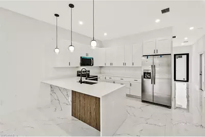 521 Lillon Ave S, Lehigh Acres, FL 33974 - Photo 13