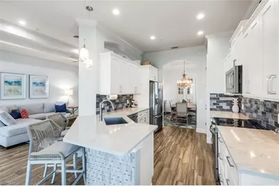 8839 Nautical Landing Cir #201, Naples, FL 34120 - Photo 13